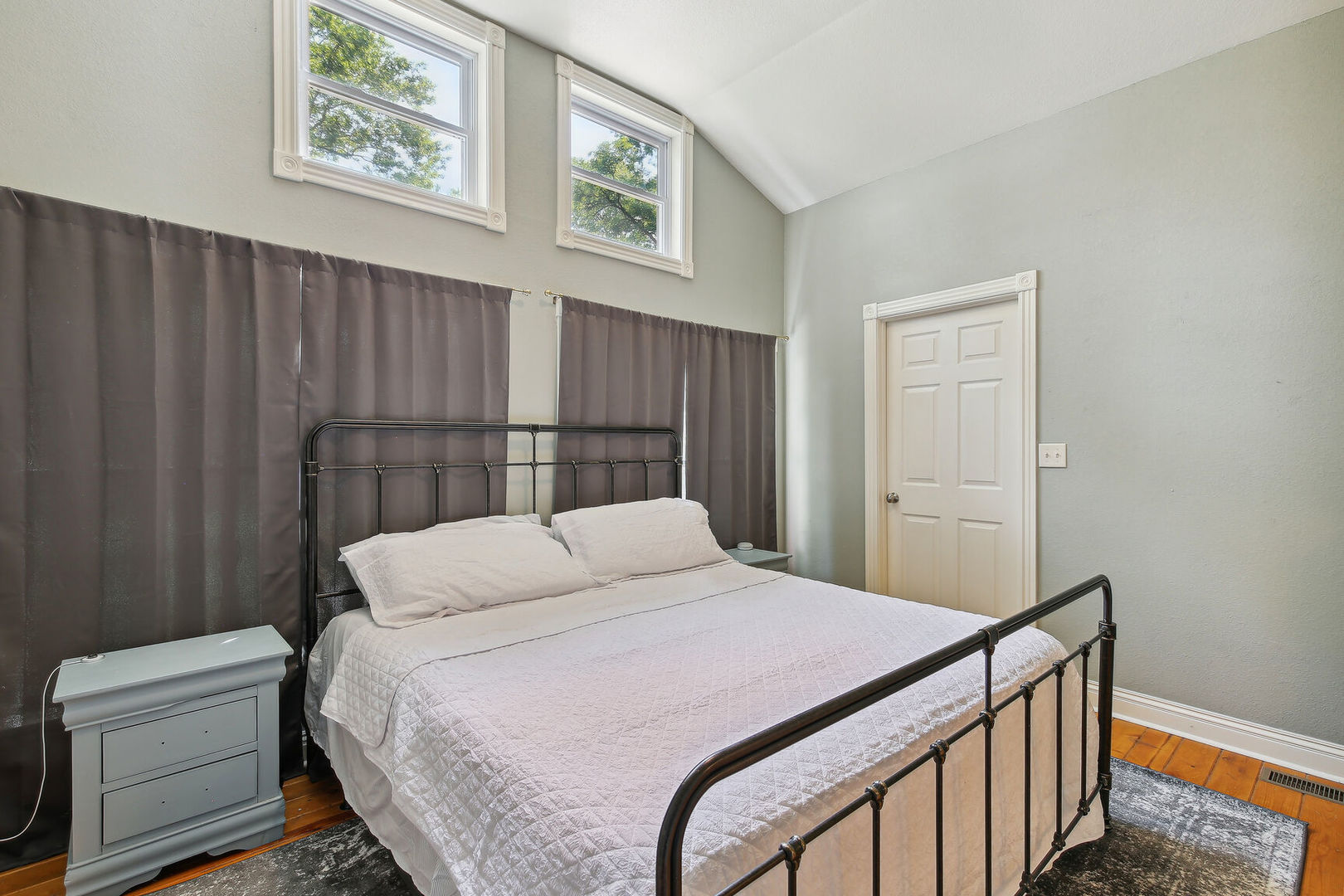664 North Macon Street Bement, IL 61813 - Photo 11 of 24 a bedroom with a bed and a painting on the wall