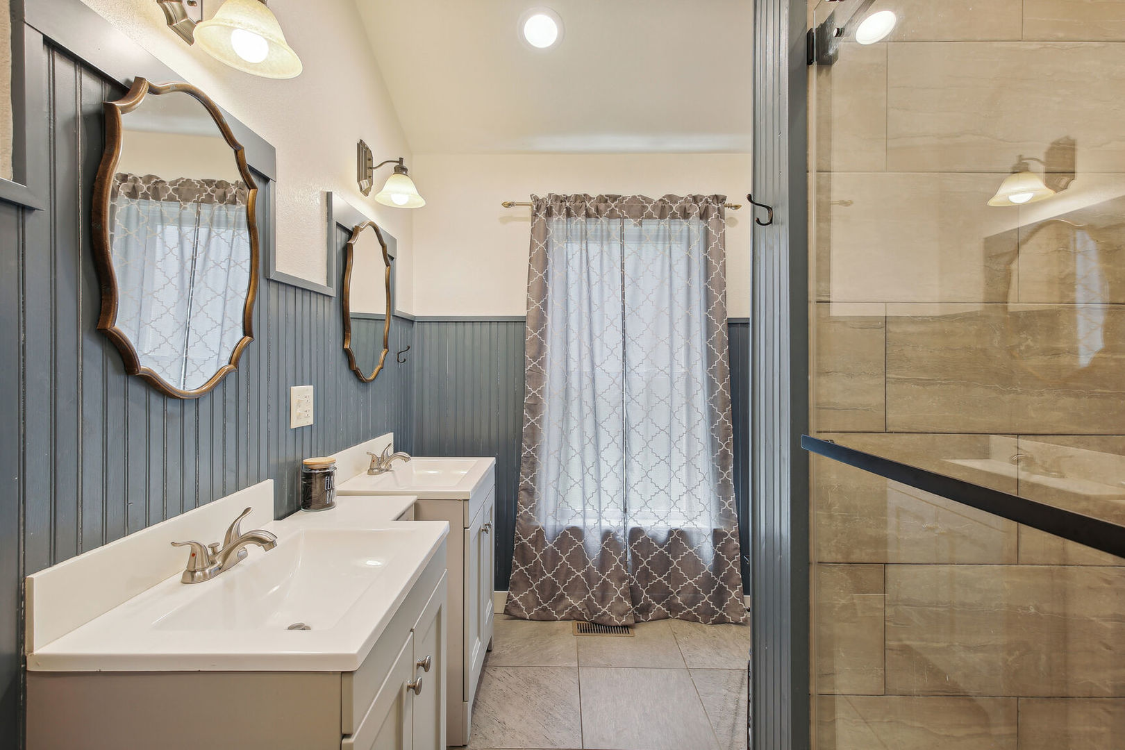 664 North Macon Street Bement, IL 61813 - Photo 12 of 24 a bathroom with a sink and a mirror
