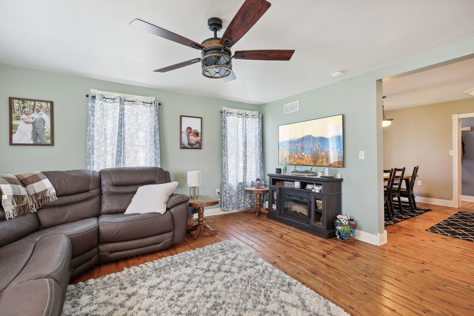 664 North Macon Street Bement, IL 61813 - Photo 6 of 24 a living room with furniture and a flat screen tv