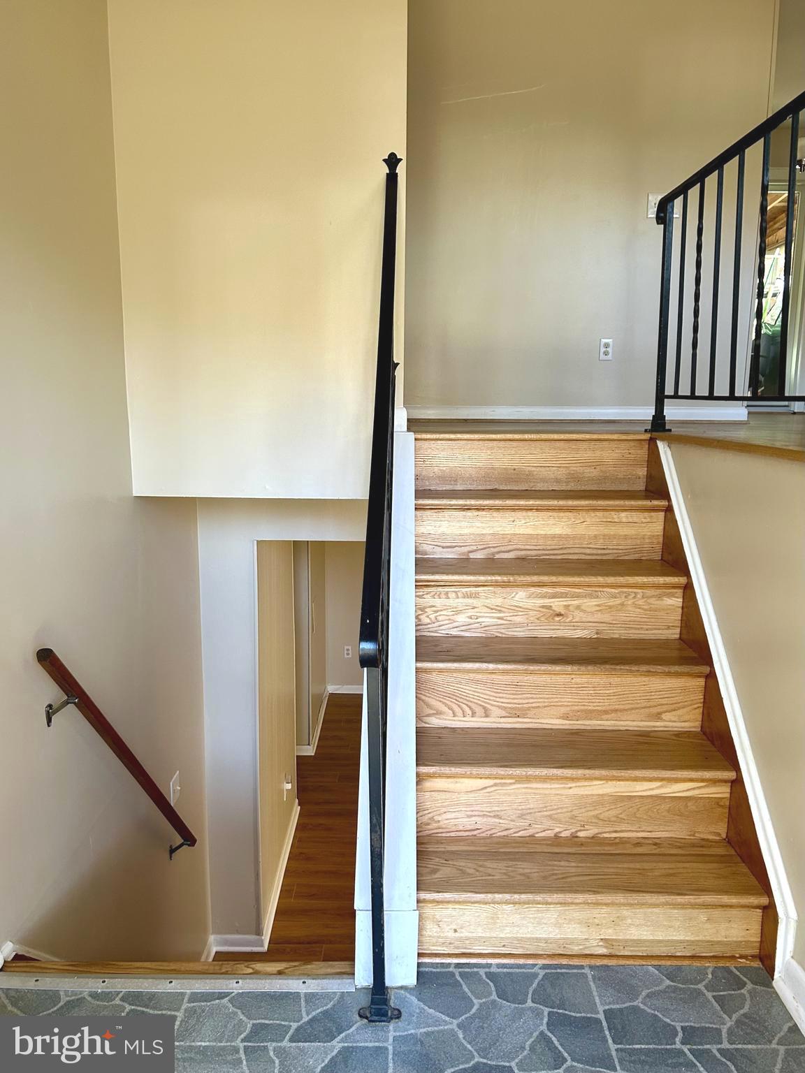 1527 Patuxent Manor Road Davidsonville, MD 21035 - Photo 16 of 36 a view of staircase with white walls and railing