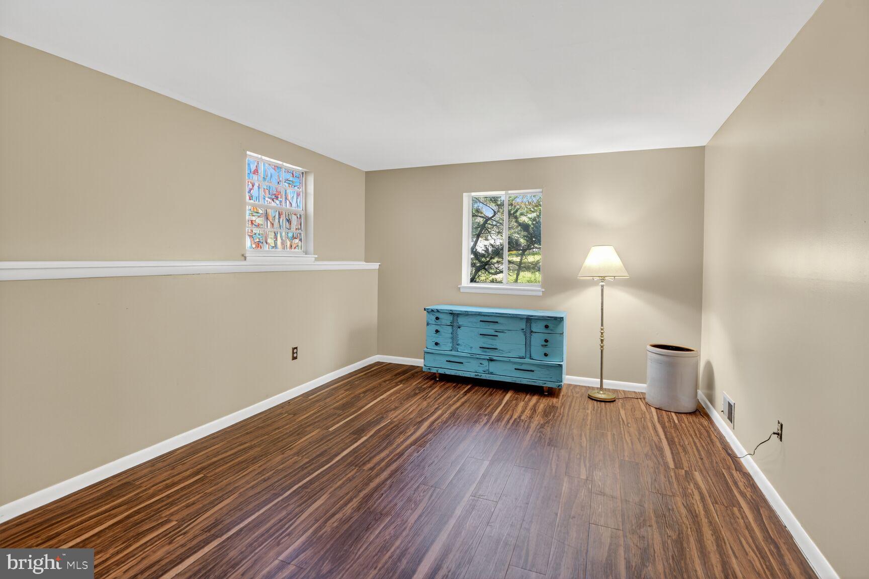 1527 Patuxent Manor Road Davidsonville, MD 21035 - Photo 18 of 36 a view of empty room with wooden floor