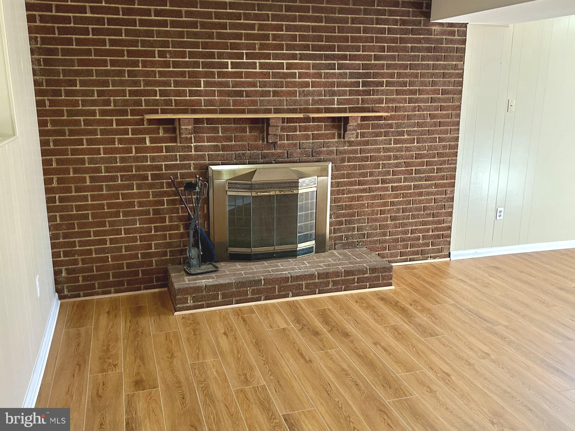 1527 Patuxent Manor Road Davidsonville, MD 21035 - Photo 20 of 36 a view of empty room with wooden floor