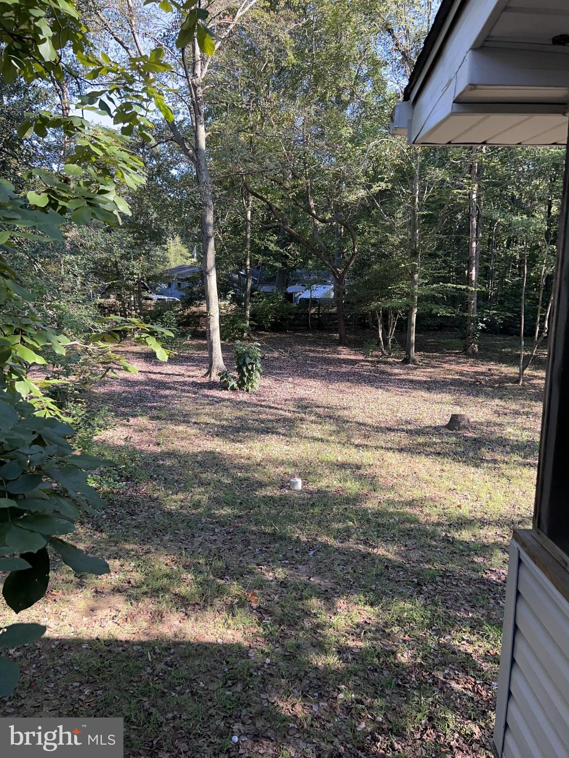 1527 Patuxent Manor Road Davidsonville, MD 21035 - Photo 25 of 36 a view of a yard with table and chair