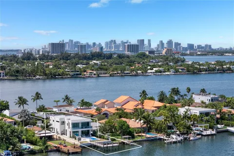 an aerial view of a city with houses