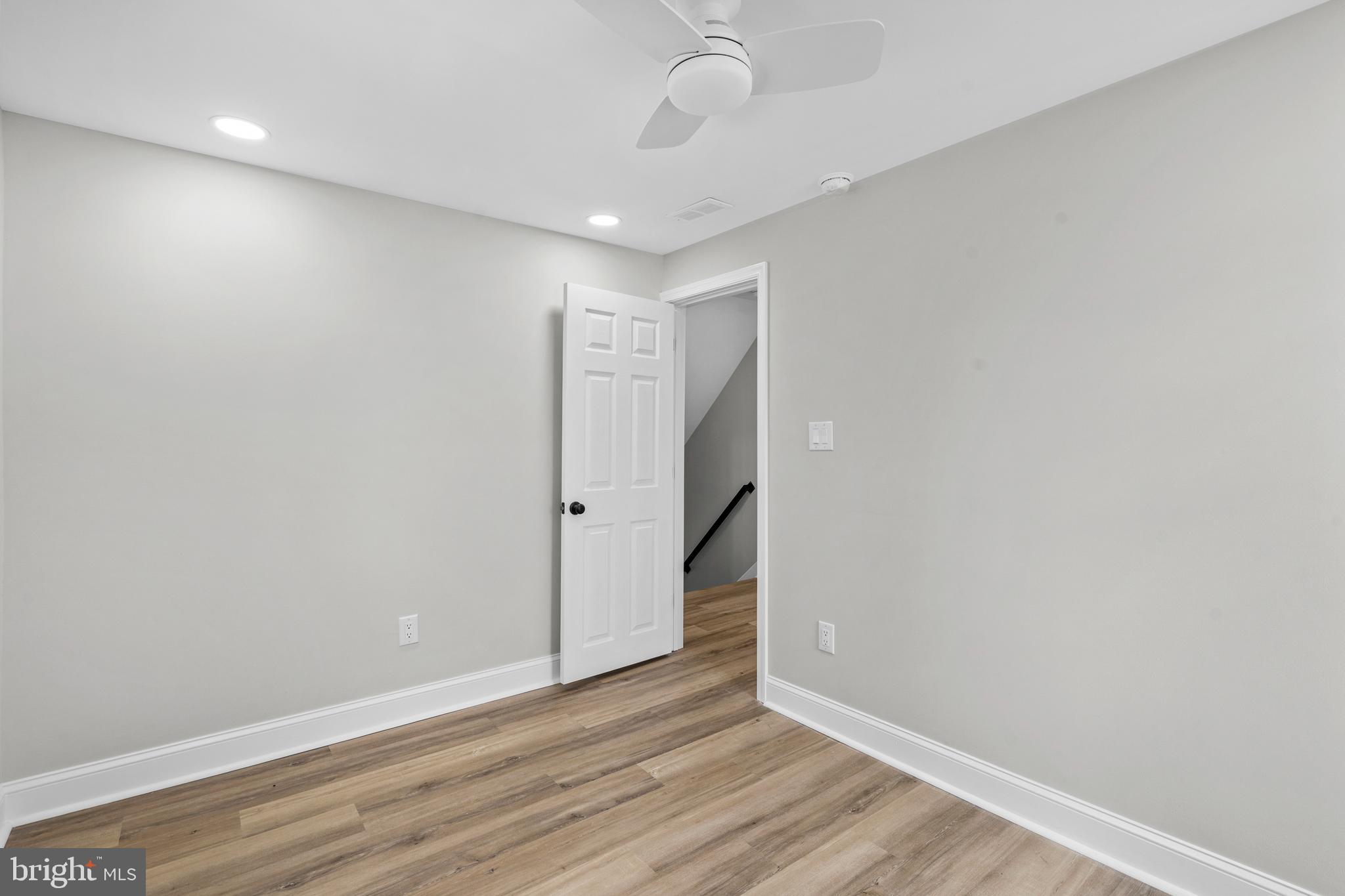 1082 Edge Hill Road Abington, PA 19001 - Photo 26 of 37 a view of an empty room with wooden floor