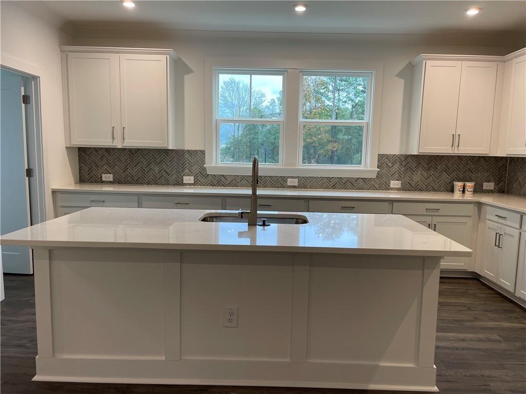 3391 Catalan Alley Avondale Estates, GA 30002 - Photo 8 of 18 a kitchen with a sink a window and cabinets