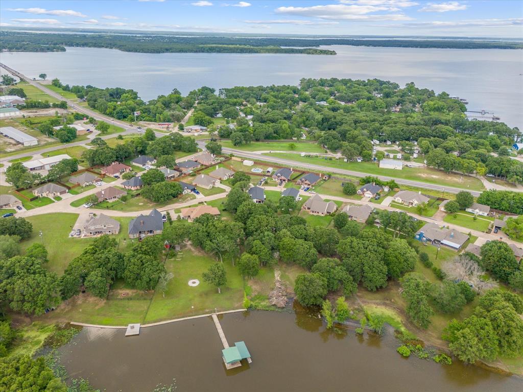 2811 Rodeo Drive Quinlan, TX 75474 - Photo 32 of 35 Aerial perspective of suburban area featuring a large body of water