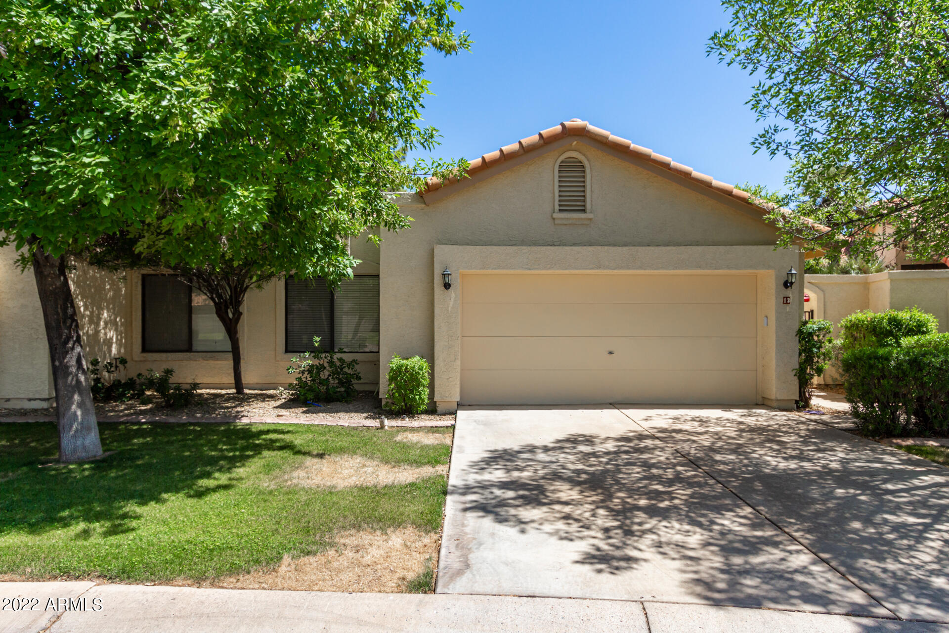 13 West Ranch Road Tempe, AZ 85284 - Photo 2 of 22 2 CAR GARAGE WITH EXTRA STORAGE CABINETS