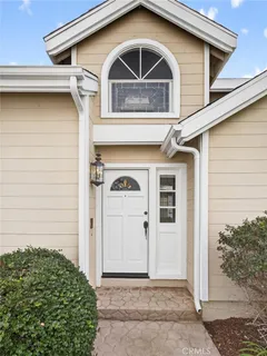 a front view of a house with garage