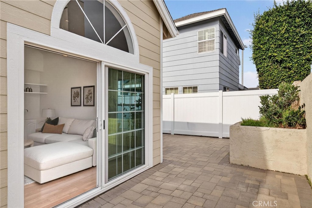 1714 Flower Avenue Torrance, CA 90503 - Photo 36 of 40 a view of a house with a large window and a yard