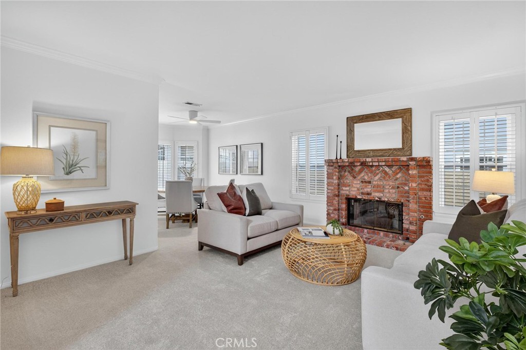 1714 Flower Avenue Torrance, CA 90503 - Photo 7 of 40 a living room with furniture a fireplace and a potted plant