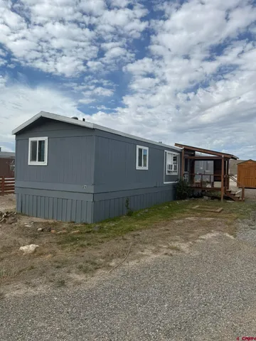 a house view with a garden space