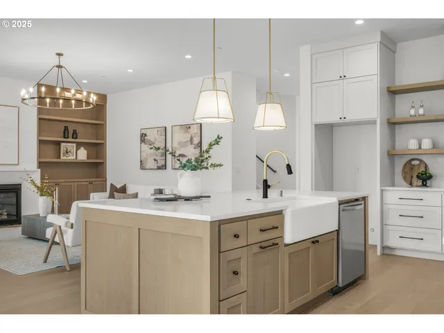 a kitchen that has a lot of cabinets in it