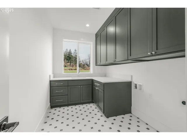 a bathroom with a sink a vanity and mirror