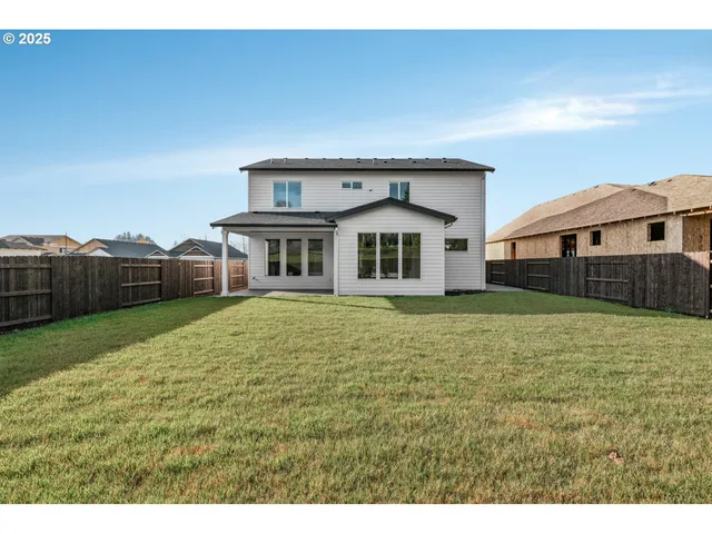 a house view with a garden space