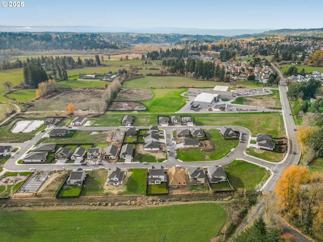 a view of a swimming pool with lawn chairs