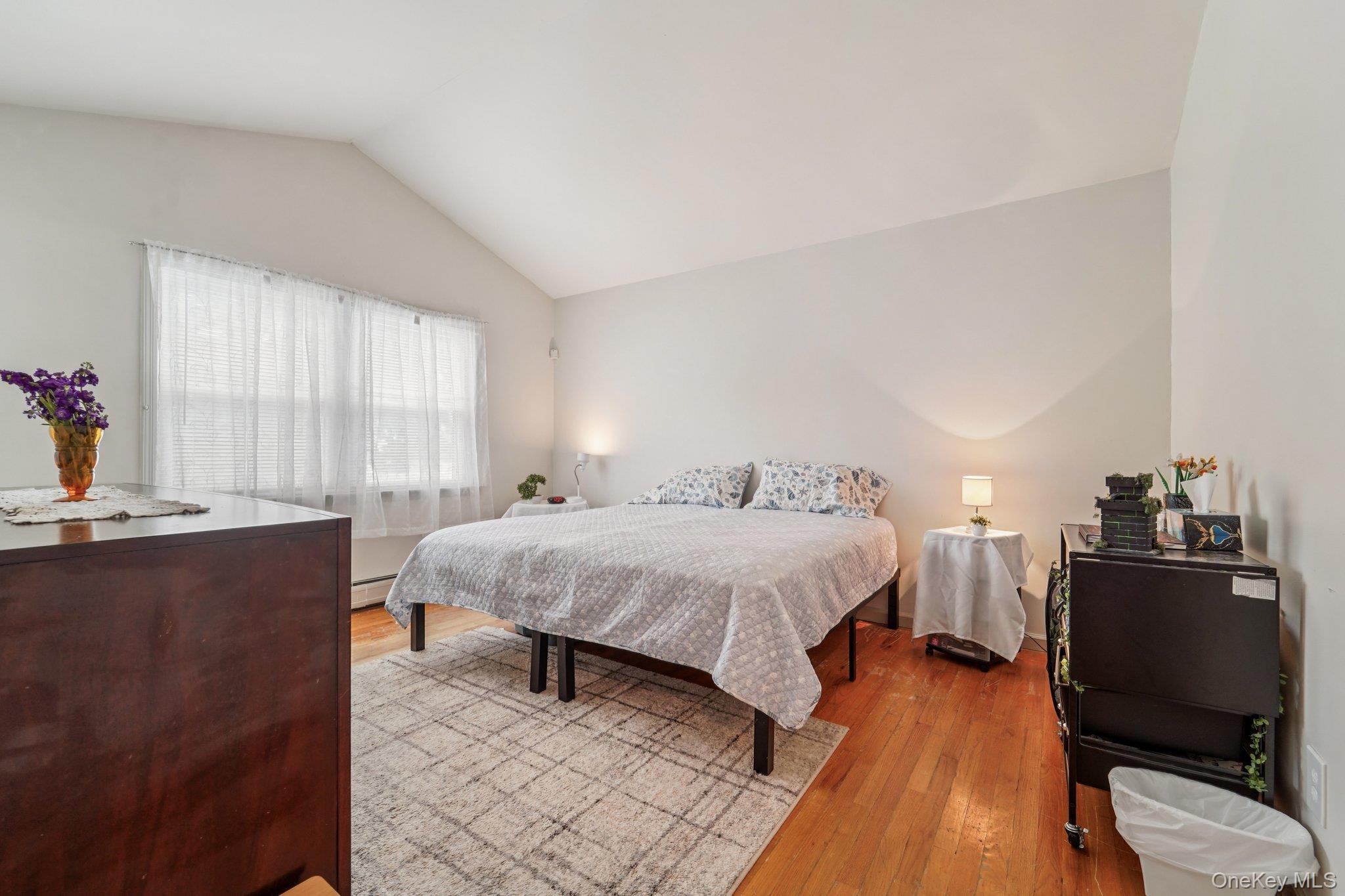 10 Ward Street Suffern, NY 10901 - Photo 17 of 34 Bedroom featuring vaulted ceiling and light wood finished floors