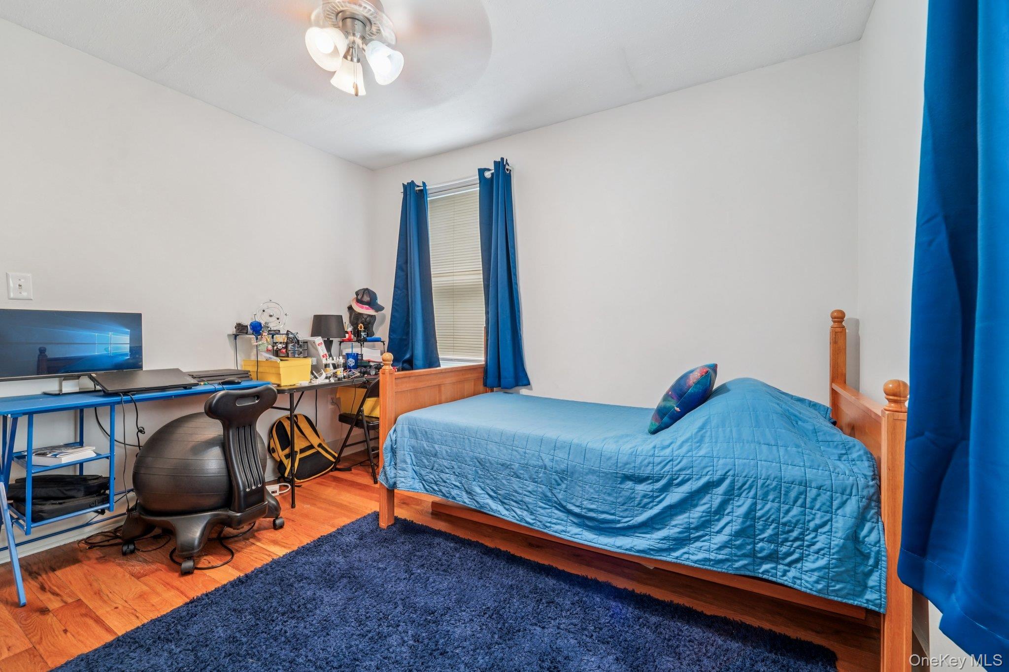10 Ward Street Suffern, NY 10901 - Photo 24 of 34 Bedroom featuring wood finished floors and a desk