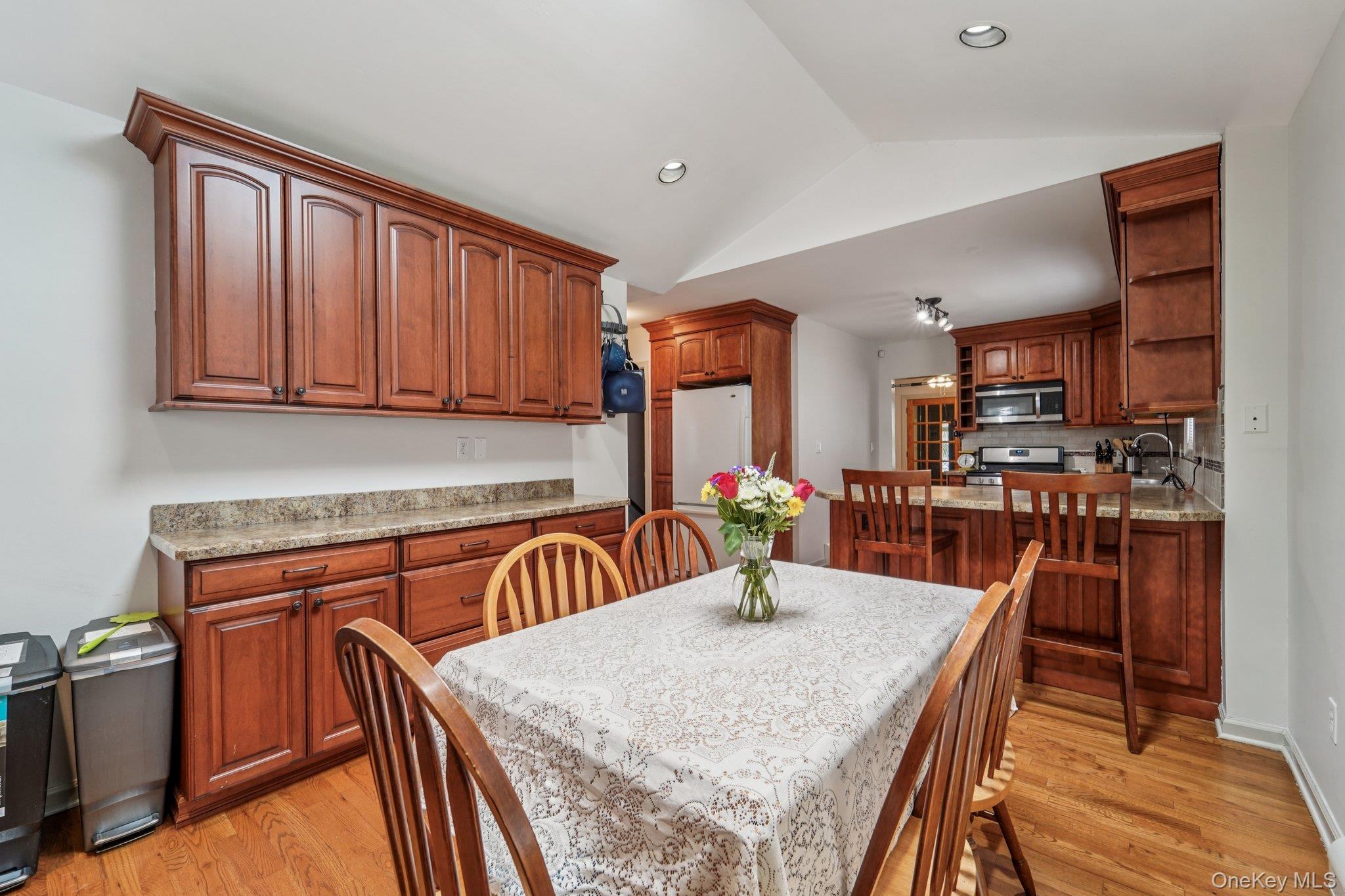 10 Ward Street Suffern, NY 10901 - Photo 9 of 34 Dining area featuring lofted ceiling, light wood-style floors, and recessed lighting