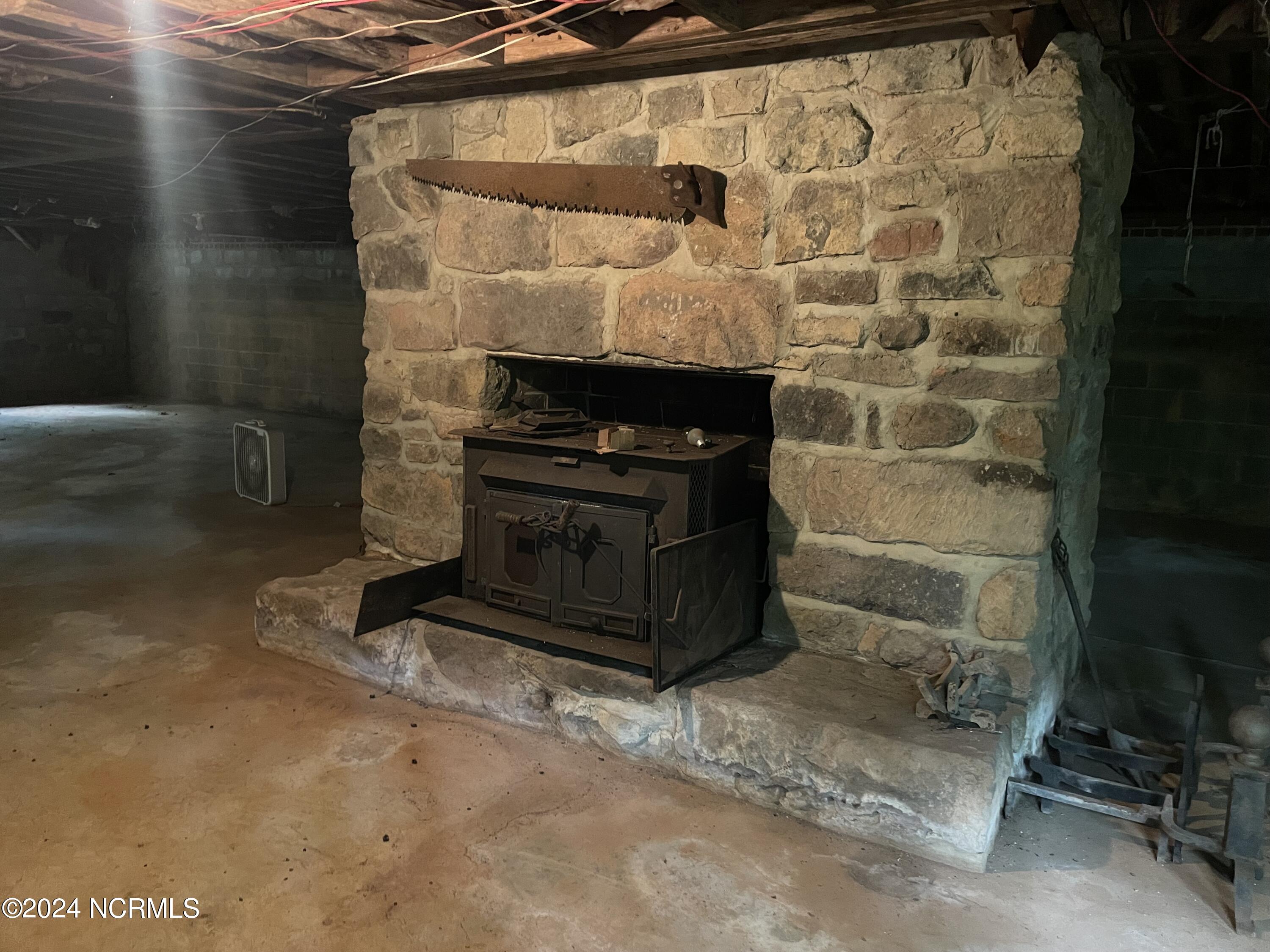 2592 Old Glendon Road Carthage, NC 28327 - Photo 19 of 23 Basement wood burning stove