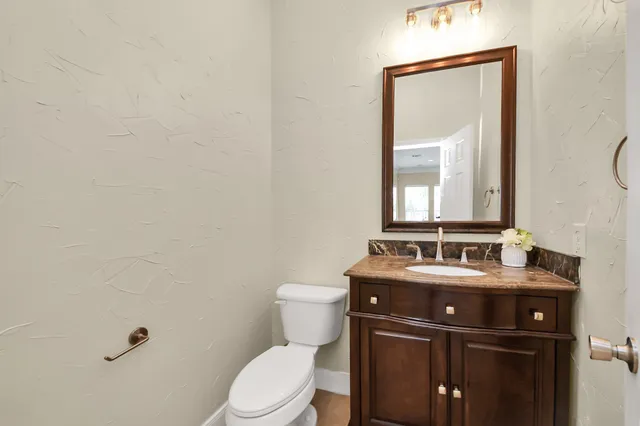 a view of staircase with a small yard