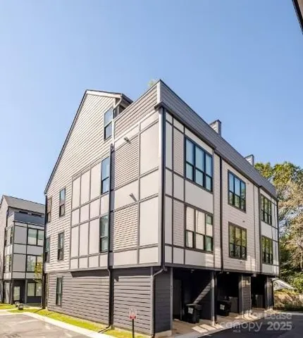 a front view of a building with glass windows