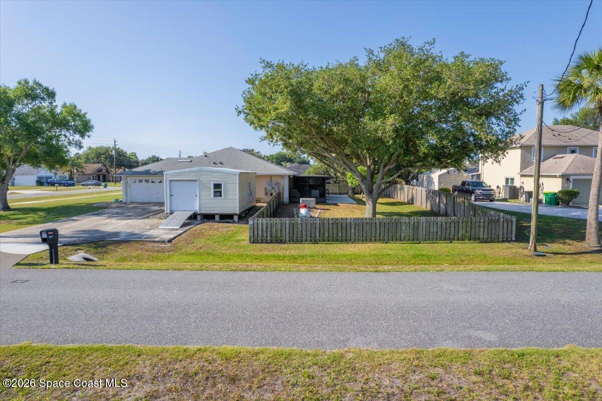 5975 Aruin Street Cocoa, FL 32927 - Photo 44 of 70 Driveway and workshop