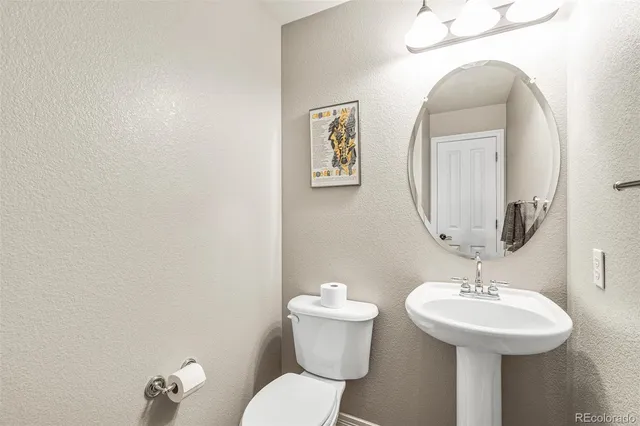 a view of storage and utility room with washer and dryer