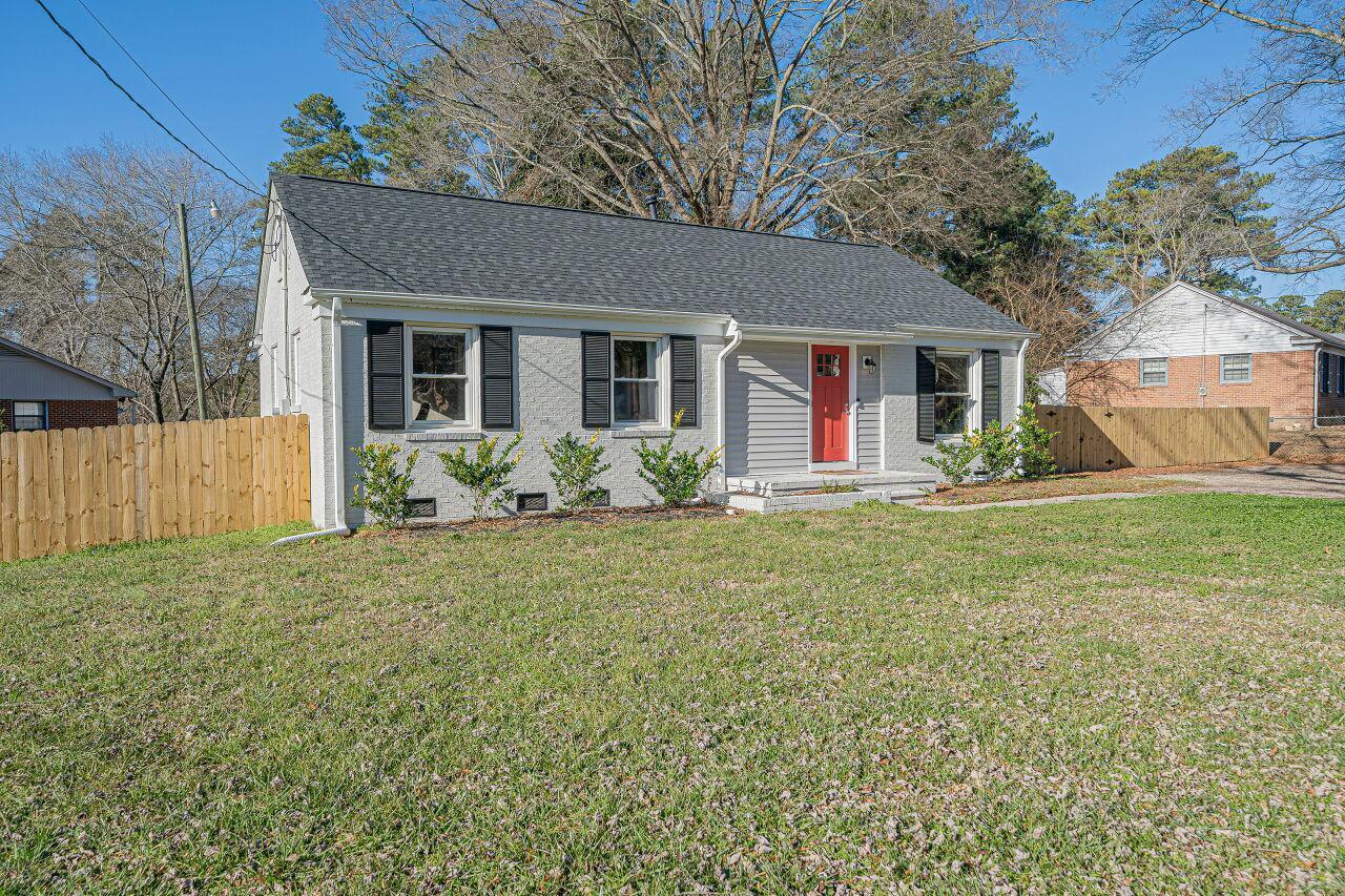 3322 Bell Drive Raleigh, NC 27610 - Photo 2 of 35 a front view of house with yard and green space