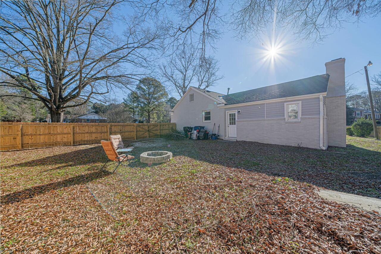 3322 Bell Drive Raleigh, NC 27610 - Photo 29 of 35 a backyard of a house with lots of green space