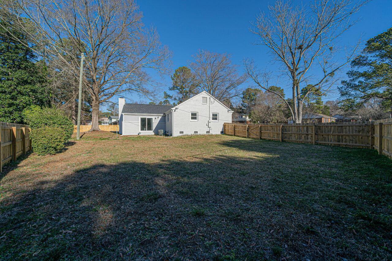 3322 Bell Drive Raleigh, NC 27610 - Photo 31 of 35 a front view of a house with a yard