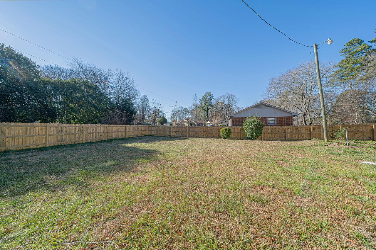 3322 Bell Drive Raleigh, NC 27610 - Photo 32 of 35 a view of backyard with green space