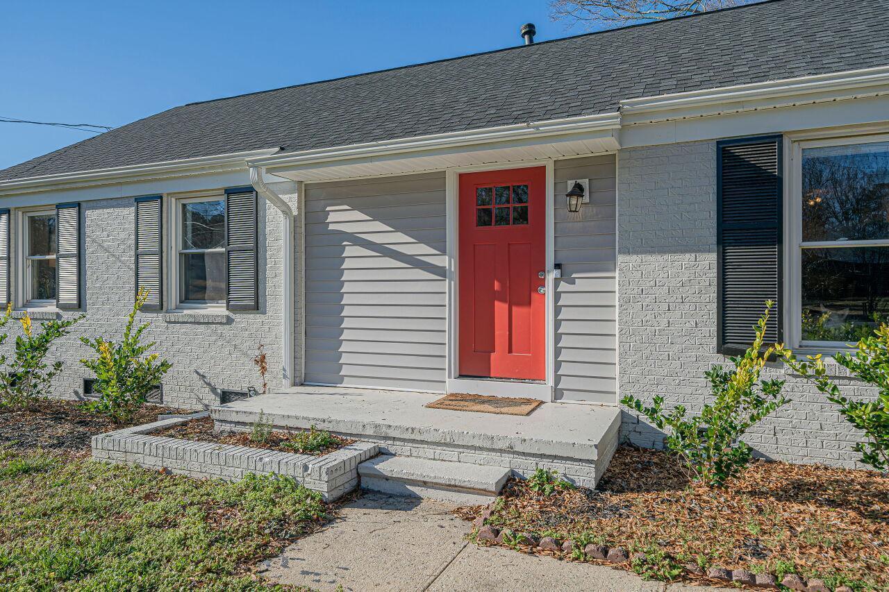 3322 Bell Drive Raleigh, NC 27610 - Photo 4 of 35 a front view of a house with garden
