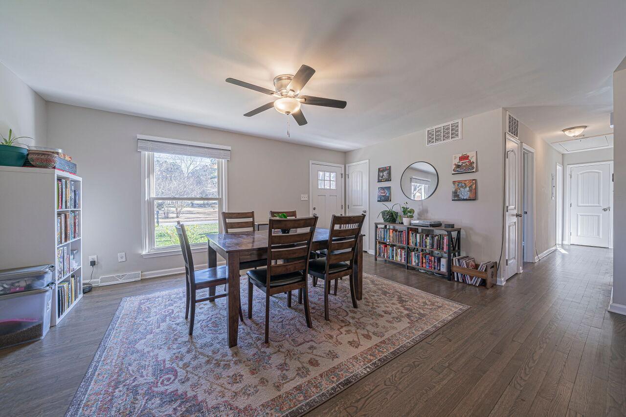 3322 Bell Drive Raleigh, NC 27610 - Photo 5 of 35 a view of a dining room with furniture window and wooden floor