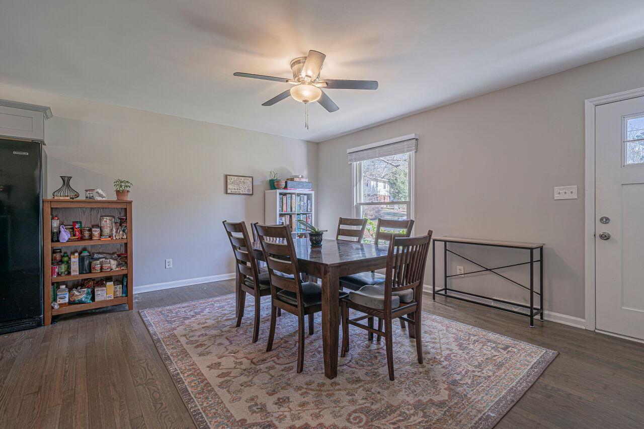 3322 Bell Drive Raleigh, NC 27610 - Photo 7 of 35 a view of a dining room with furniture and wooden floor