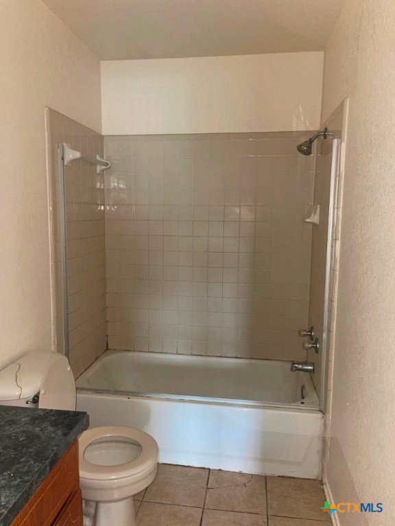 4507 Deek Drive, Unit A Killeen, TX 76549 - Photo 12 of 27 a bathroom with a granite countertop bathtub shower sink and toilet