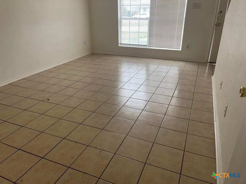 4507 Deek Drive, Unit A Killeen, TX 76549 - Photo 6 of 27 a view of an empty room and window