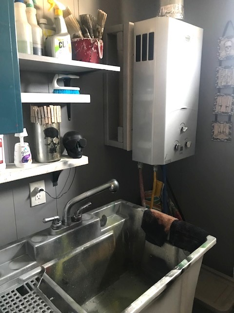 84 Candlegate Circle Matteson, IL 60443 - Photo 15 of 15 a kitchen with a sink and a stove top oven