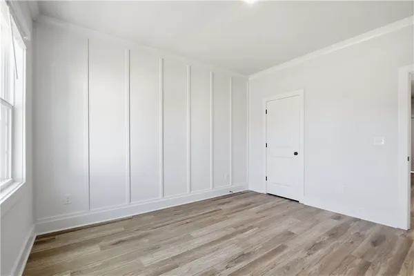 a living room with furniture and windows