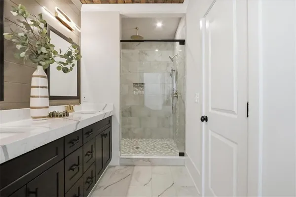 a view of an entryway with wooden floor