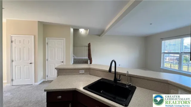 a view of entryway with stairs