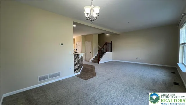 a view of a livingroom with a chandelier