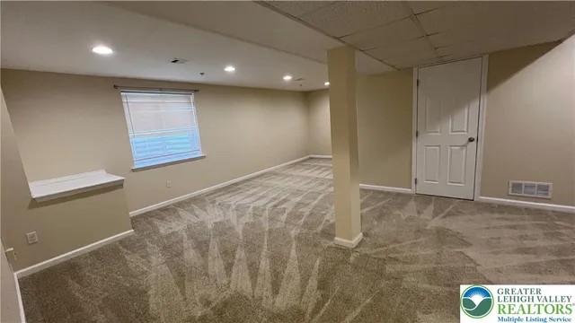 an empty room with a bathroom