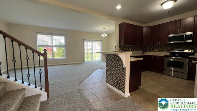 a view of a hallway with entryway