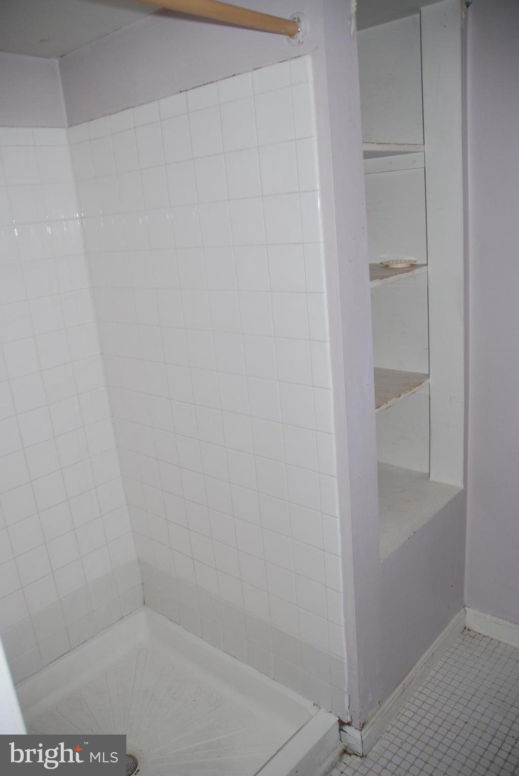 12603 Bluhill Road Silver Spring, MD 20906 - Photo 15 of 21 a close up of a shower