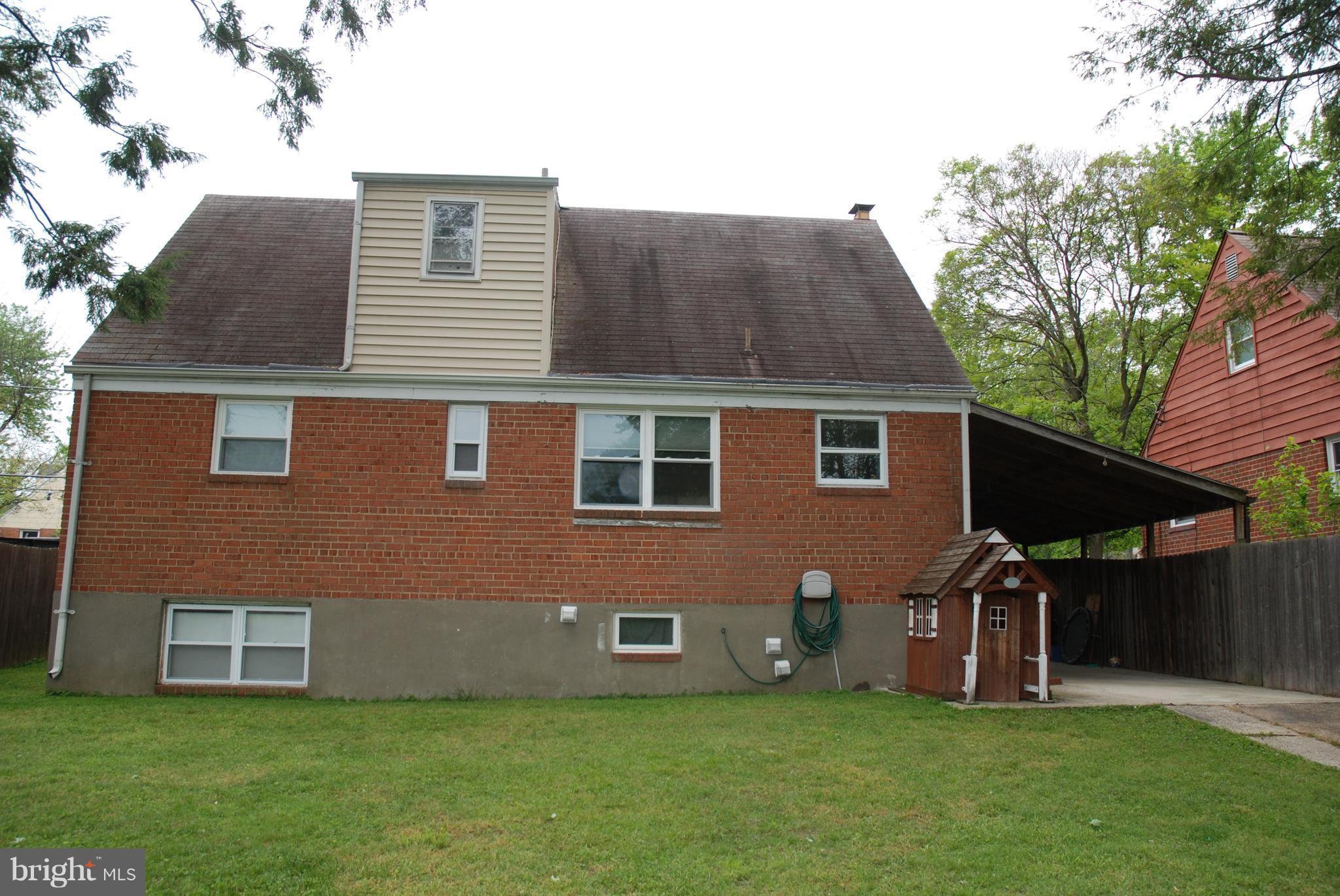 12603 Bluhill Road Silver Spring, MD 20906 - Photo 18 of 21 a front view of a house with a yard