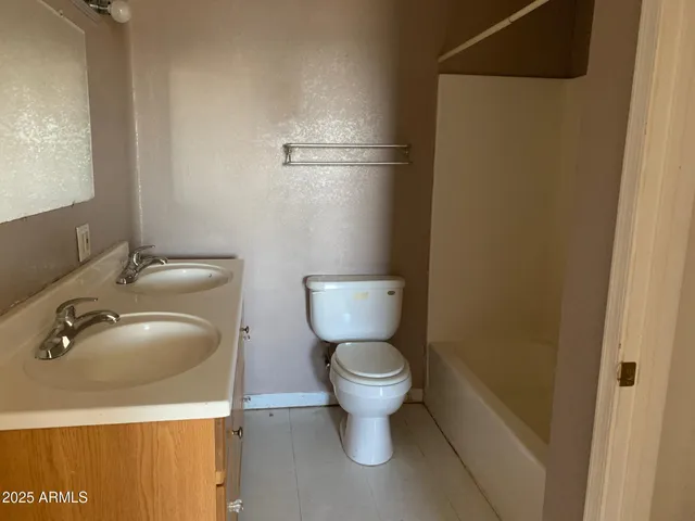 a bathroom with a sink and a toilet