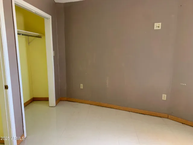 an empty room with a door