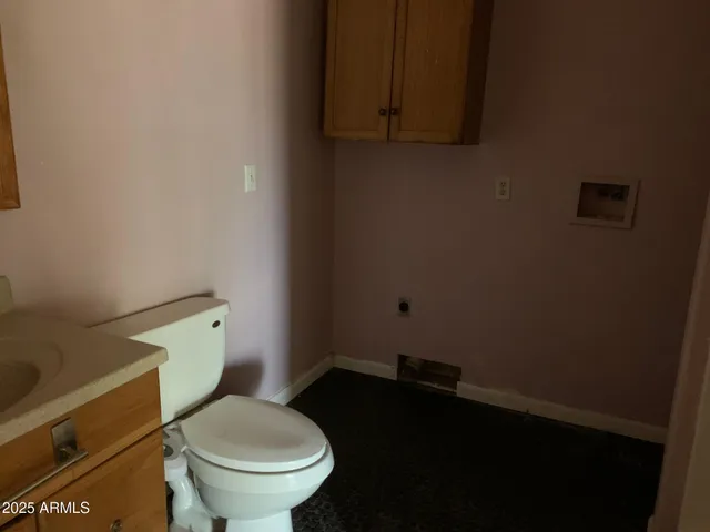 a bathroom with a toilet