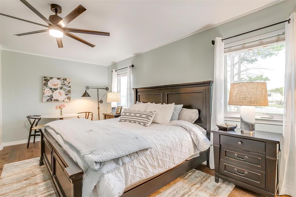 520 Deer Trail Gordon, TX 76453 - Photo 27 of 40 Bedroom featuring ornamental molding, a ceiling fan, and light wood-style floors